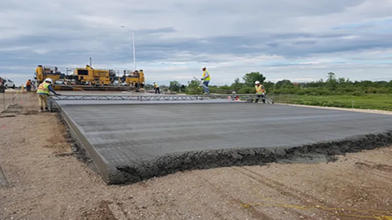 Workers concrete paving Winnipeg